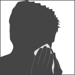Person with cold/flu blowing nose